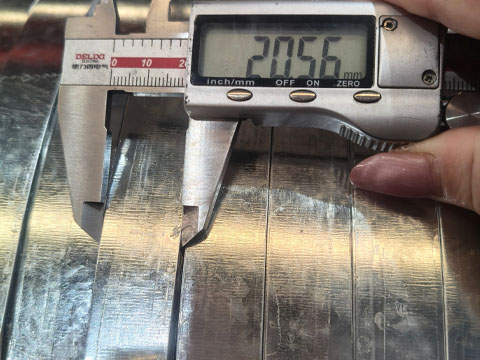 Galvanized steel strip width measurement