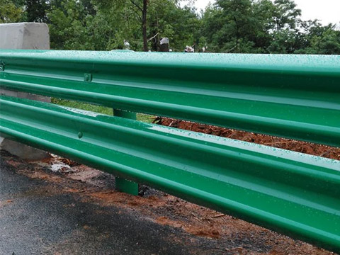 Green highway guardrail