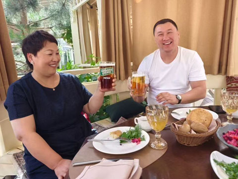 Customers invite us to eat local delicacies