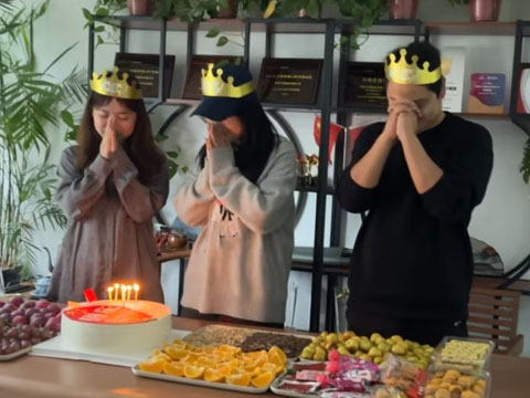 Making a wish at a birthday party