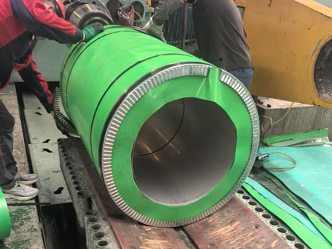 Stainless steel coils being packaged