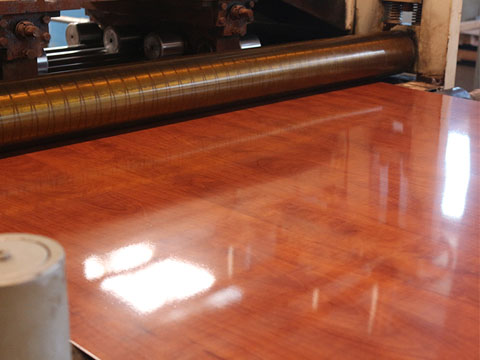 Stainless steel laminated wood grain film