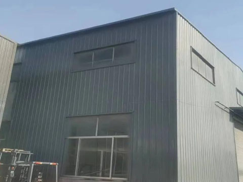 Galvanized corrugated steel sheet for exterior wall cladding