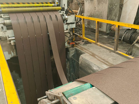 Wrinkled ppgi steel coils are being slitting into strips.