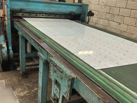 Roll material cut into sheets