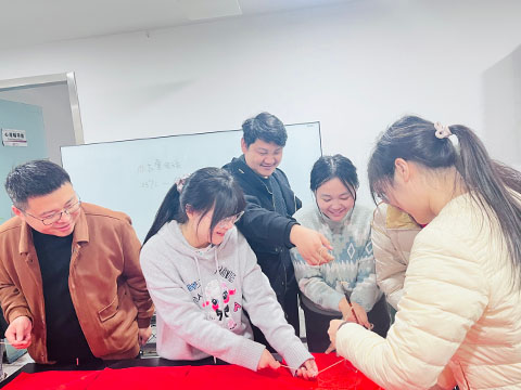 Six people began writing calligraphy.