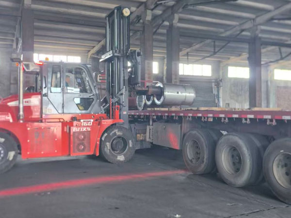 The customer is unloading his steel coils.